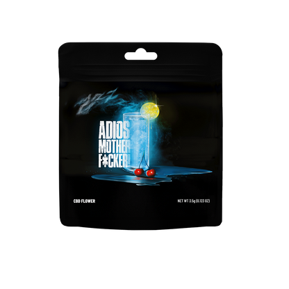 Fleur CBD Cookies Adios Mother Fucker, fleur de cannabis avec bourgeons verts, pistils orange et trichomes blancs, emballage coloré.