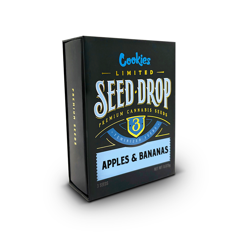 Graines THC Apples & Bananas de la marque Cookies, vue détaillée avec étiquettes colorées et emballage.